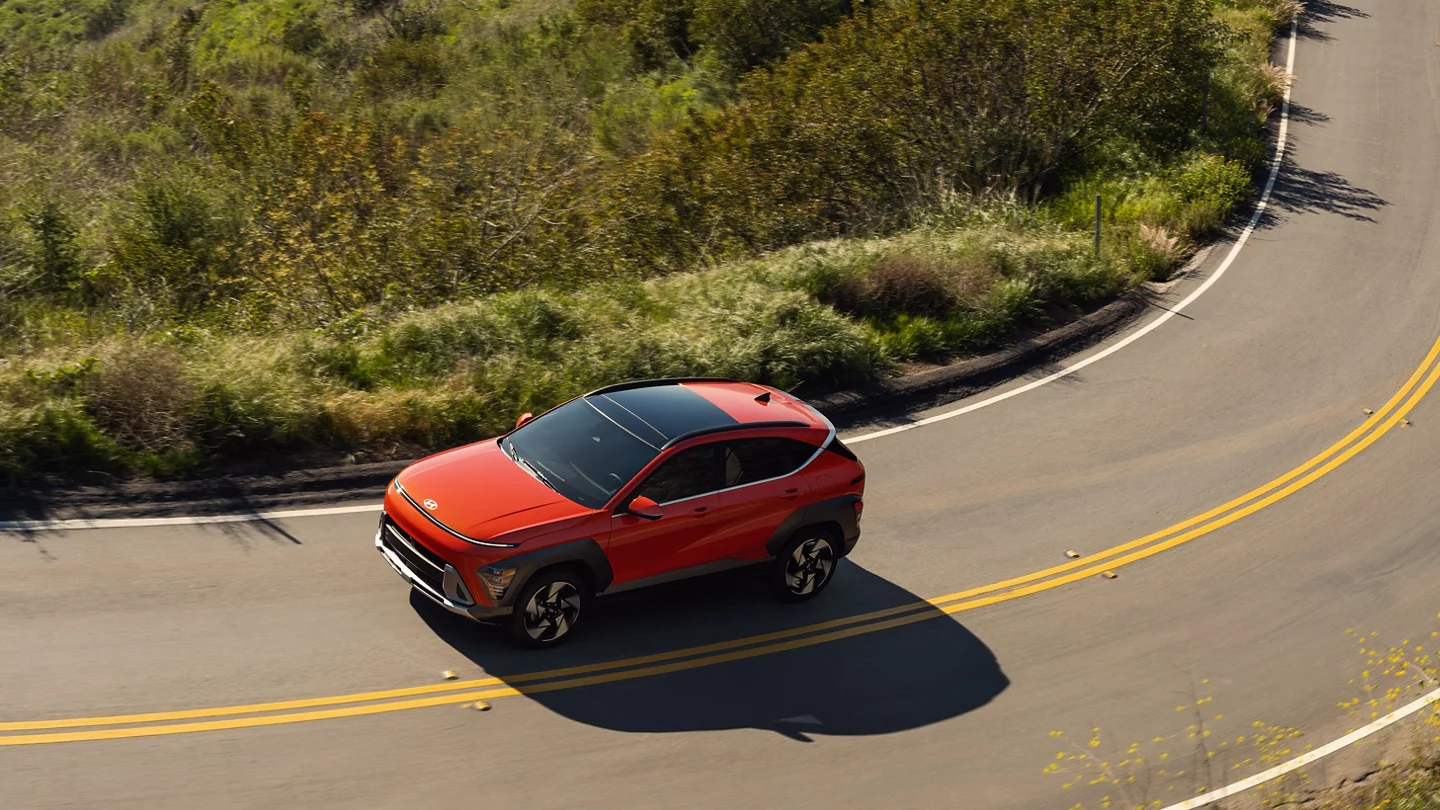 Bird's eye view of 2025 Hyundai Kona driving on the highway