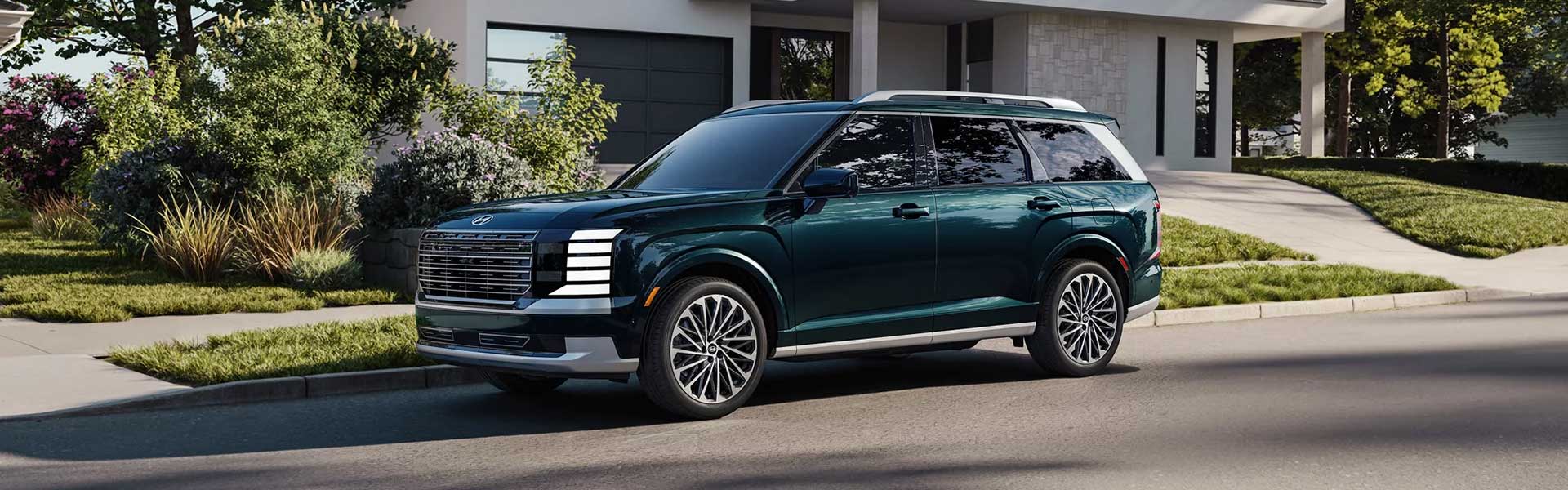 2026 Hyundai Palisade SUV parked outside modern building