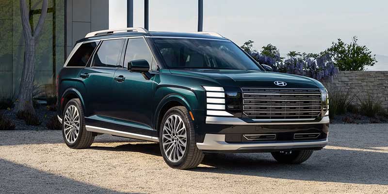 2026 Hyundai Palisade SUV parked outside modern building
