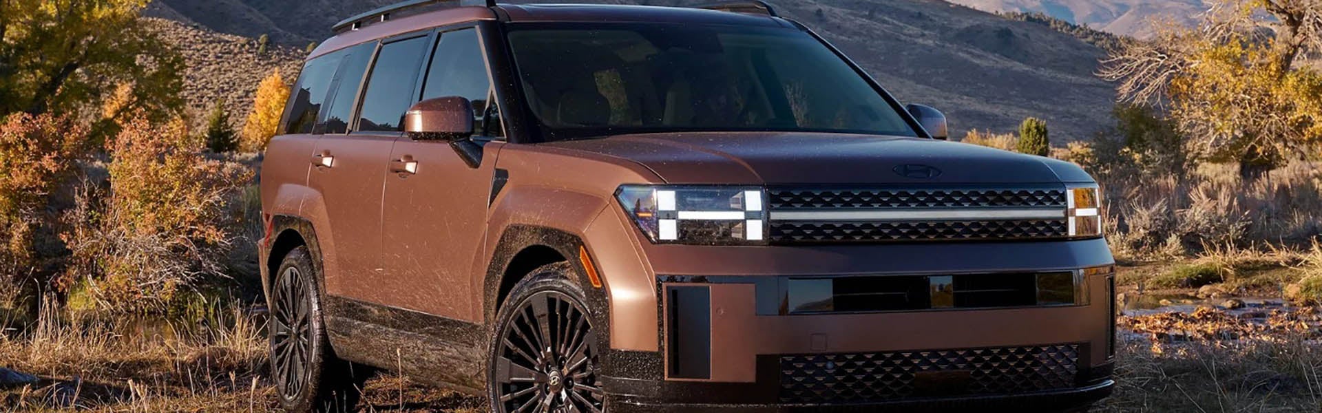 2026 Hyundai Santa Fe XRT SUV front view on rugged terrain
