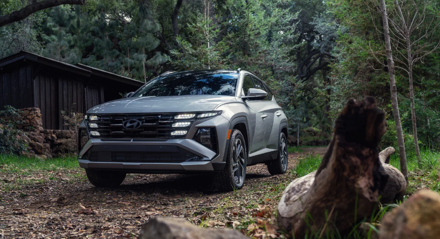 2026 Hyundai Tucson Plug-In Hybrid parked on a forest trail at Jerry V’s Honolulu Hyundai